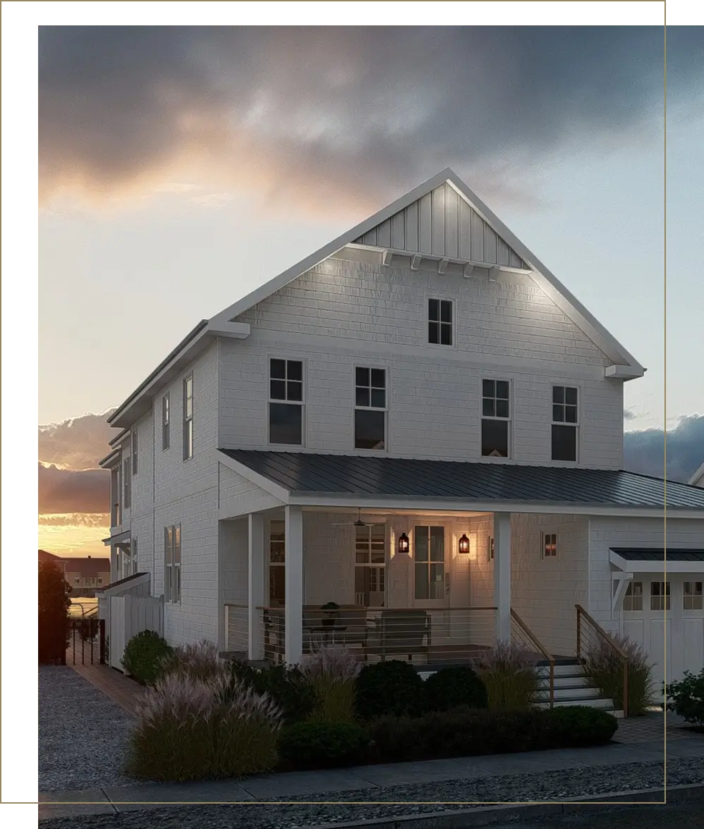 A white house with a porch and lights on.