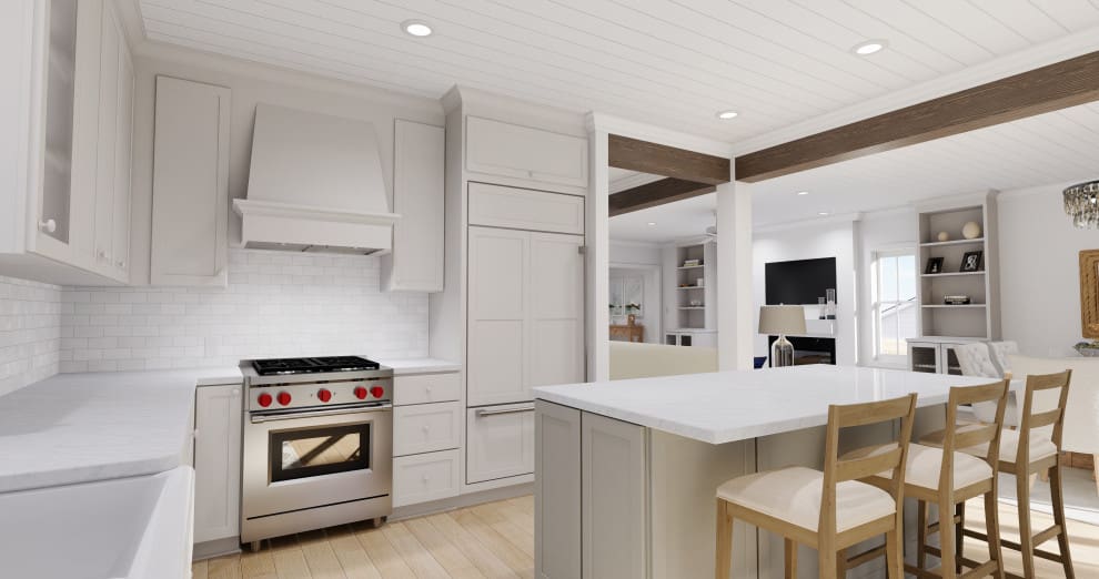 A kitchen with white cabinets and wood floors.