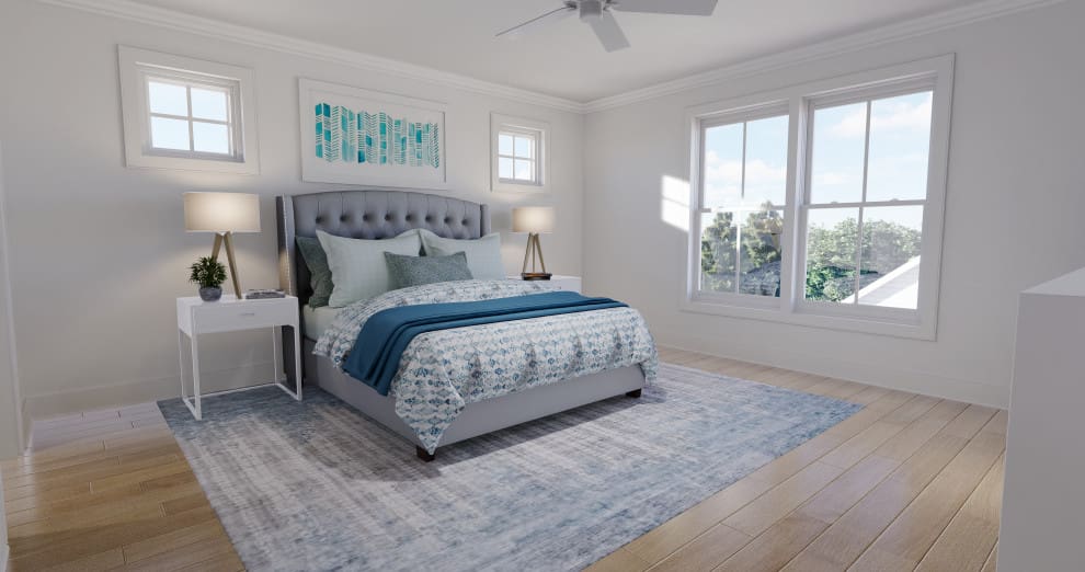 A bedroom with a bed, nightstand and window.