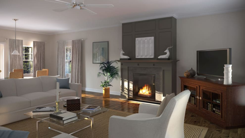 A living room with a fireplace and white furniture.